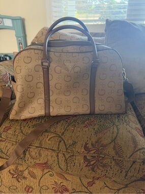 GUESS Tan Monogram Duffel Bag with Brown Trim